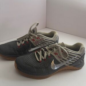 Nike Black and Gray Running Shoes with Silver Logo